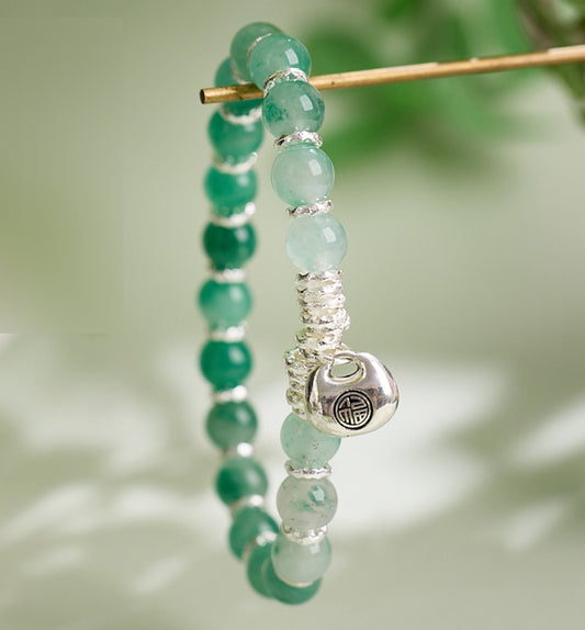Jade Bracelet with Money Bag Pendant
